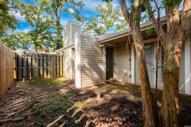 1905 Broken Bow, North Little Rock, AR 72116 - view of side of property featuring a chimney
