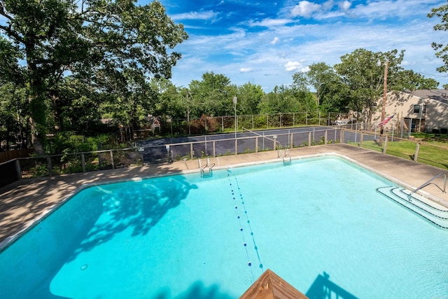 1905 Broken Bow, North Little Rock, AR 72116 - view of swimming pool with view of wooded area