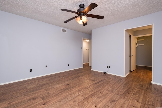 1905 Broken Bow, North Little Rock, AR 72116 - unfurnished bedroom featuring wood finished floors, a textured ceiling, ceiling fan, and a spacious closet