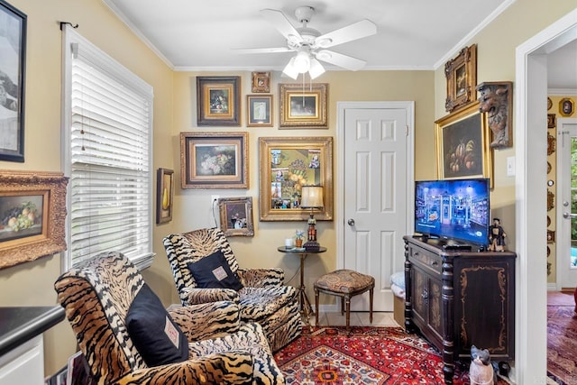 7111 W Markham St, Little Rock, AR 72205 - living area with a ceiling fan and ornamental molding