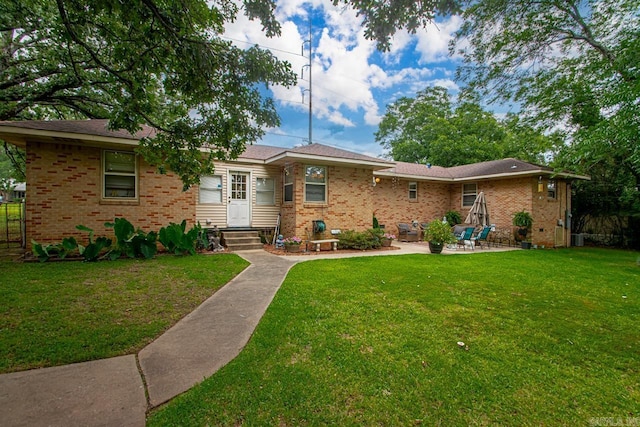 7111 W Markham St, Little Rock, AR 72205 - ranch-style home with brick siding and a patio
