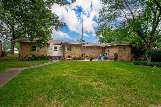 7111 W Markham St, Little Rock, AR 72205 - ranch-style house with brick siding, a front yard, and entry steps