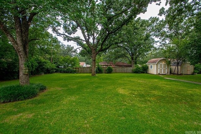 7111 W Markham St, Little Rock, AR 72205 - view of yard featuring a storage unit