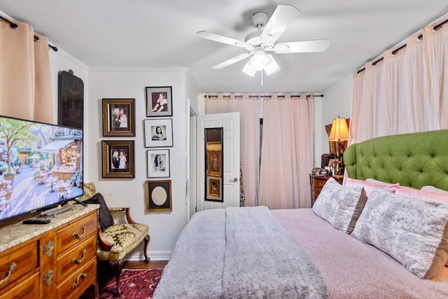 7111 W Markham St, Little Rock, AR 72205 - bedroom featuring a ceiling fan and ornamental molding