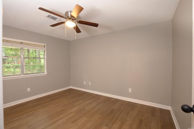 6905 White Oak Cv, White Hall, AR 71602 - empty room featuring wood finished floors, a ceiling fan, and a textured ceiling
