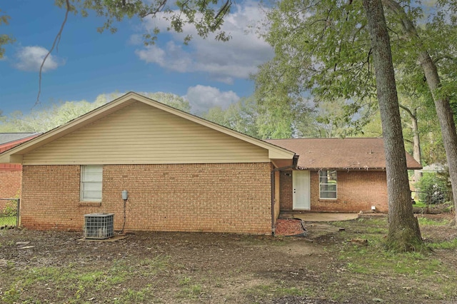 6905 White Oak Cv, White Hall, AR 71602 - view of home's exterior with brick siding and a cooling unit