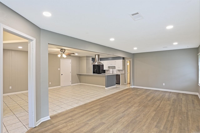 6905 White Oak Cv, White Hall, AR 71602 - unfurnished living room with light wood-style floors, a ceiling fan, and recessed lighting