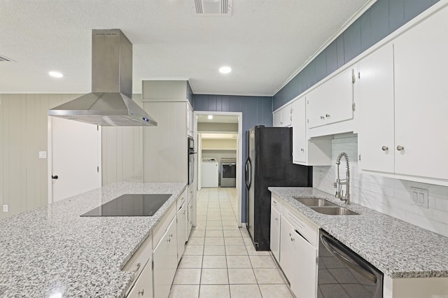 6905 White Oak Cv, White Hall, AR 71602 - kitchen featuring black appliances, range hood, washer and clothes dryer, crown molding, and white cabinetry