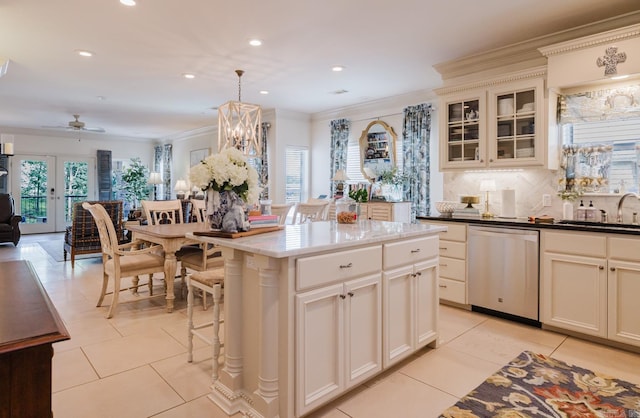 410A Halteria, Hot Springs, AR 71913 - kitchen featuring stainless steel dishwasher, ornamental molding, light tile patterned floors, open floor plan, and decorative backsplash