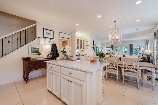 410A Halteria, Hot Springs, AR 71913 - kitchen with open floor plan, light tile patterned flooring, a chandelier, recessed lighting, and ornamental molding