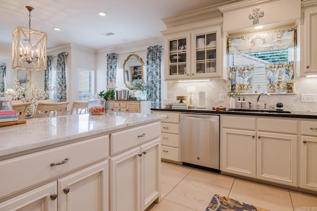 410A Halteria, Hot Springs, AR 71913 - kitchen featuring stainless steel dishwasher, a chandelier, light tile patterned flooring, ornamental molding, and tasteful backsplash