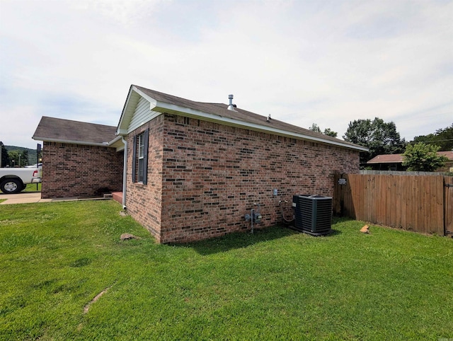 532 Scenic Valley Dr, Heber Springs, AR 72543 - view of home's exterior with a central air condition unit and brick siding