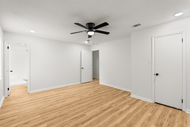 4901 Westwood Ave, Little Rock, AR 72204 - unfurnished bedroom featuring light wood-style floors, recessed lighting, ensuite bathroom, a textured ceiling, and ceiling fan