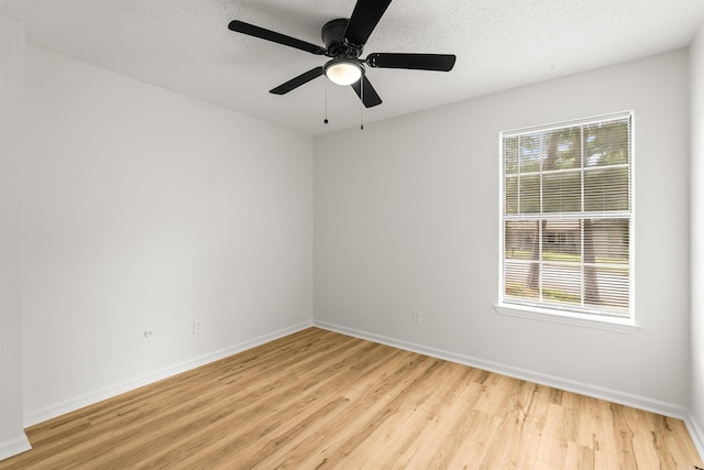 4901 Westwood Ave, Little Rock, AR 72204 - spare room with light wood-style flooring, ceiling fan, and a textured ceiling