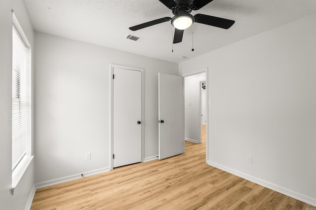 4901 Westwood Ave, Little Rock, AR 72204 - unfurnished bedroom featuring wood finished floors and ceiling fan