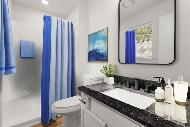 4901 Westwood Ave, Little Rock, AR 72204 - full bath featuring vanity, a shower with curtain, and wood finished floors