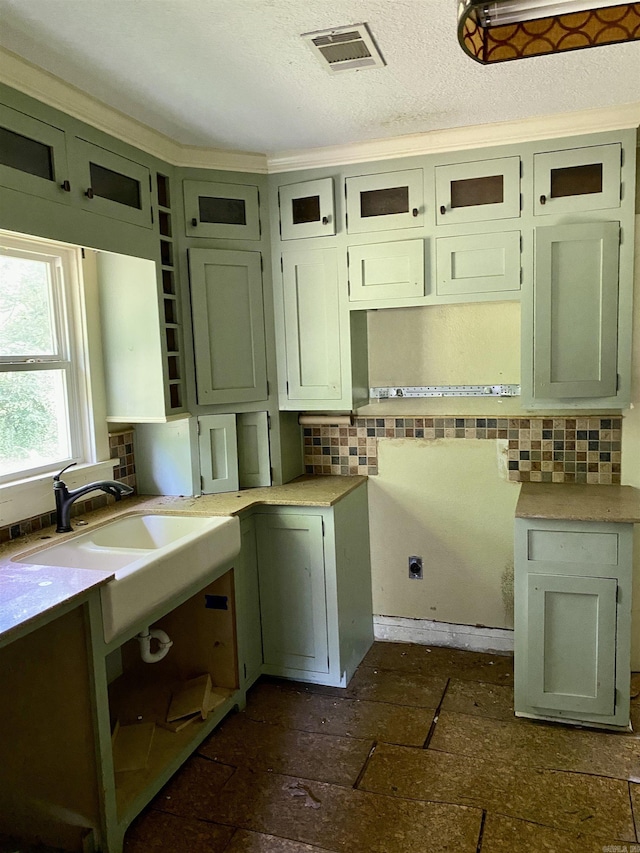 2767 E Main St, Lamar, AR 72846 - kitchen featuring tasteful backsplash, light countertops, and a textured ceiling