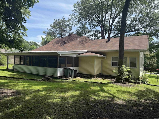 408 Case St, Heber Springs, AR 72543 - rear view of house with a lawn and a sunroom