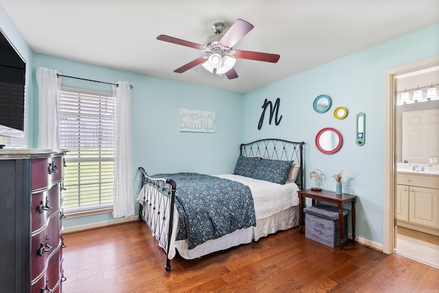 144 Summit Valley Cir, Maumelle, AR 72113 - bedroom with wood finished floors, ensuite bathroom, and a ceiling fan