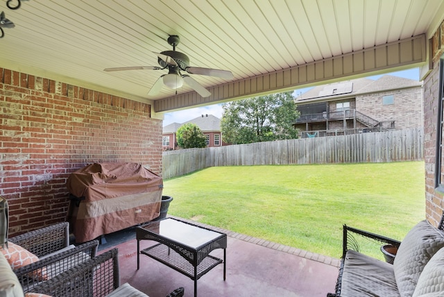 144 Summit Valley Cir, Maumelle, AR 72113 - fenced backyard with ceiling fan and a patio area