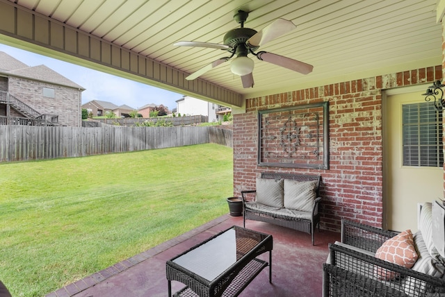 144 Summit Valley Cir, Maumelle, AR 72113 - fenced backyard featuring an outdoor hangout area, a ceiling fan, and a patio area