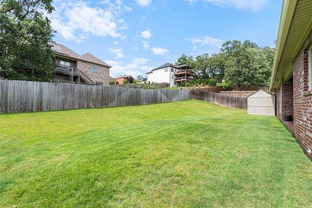 144 Summit Valley Cir, Maumelle, AR 72113 - fenced backyard featuring a storage unit and a residential view