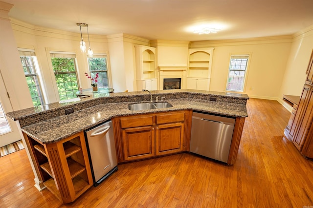 22 Jacob Pl, Little Rock, AR 72211 - kitchen featuring stainless steel dishwasher, brown cabinets, wood finished floors, and open shelves