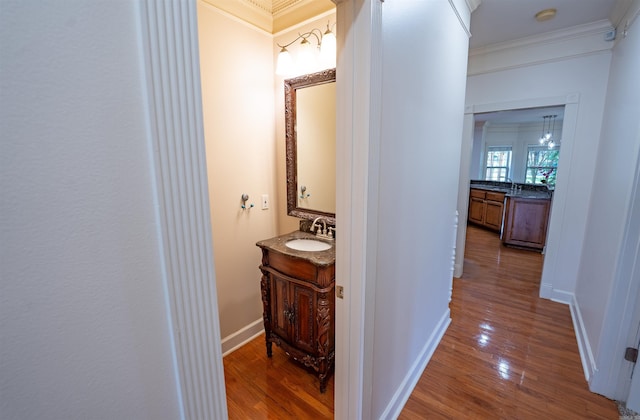 22 Jacob Pl, Little Rock, AR 72211 - corridor with ornamental molding and wood finished floors