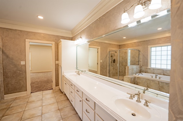 22 Jacob Pl, Little Rock, AR 72211 - bathroom featuring a stall shower, a bath, ornamental molding, double vanity, and tile patterned floors