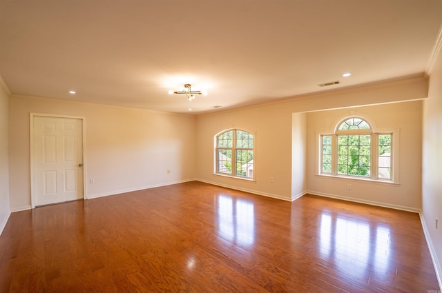 22 Jacob Pl, Little Rock, AR 72211 - unfurnished room featuring ornamental molding, dark wood-type flooring, and recessed lighting
