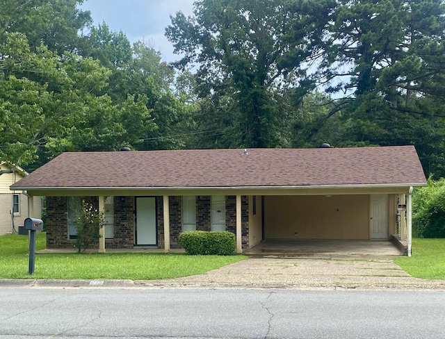 9425 Labette Dr, Little Rock, AR 72205 - ranch-style house featuring asphalt driveway, a front yard, roof with shingles, and a carport