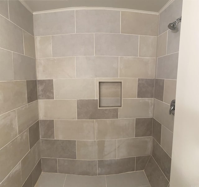 9425 Labette Dr, Little Rock, AR 72205 - full bathroom with crown molding and a tile shower
