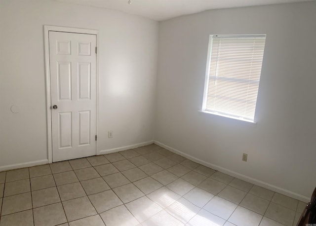 9425 Labette Dr, Little Rock, AR 72205 - spare room with light tile patterned floors and baseboards