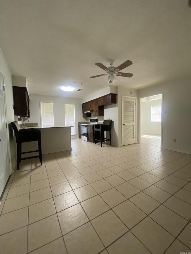 9425 Labette Dr, Little Rock, AR 72205 - living room featuring light tile patterned flooring and ceiling fan