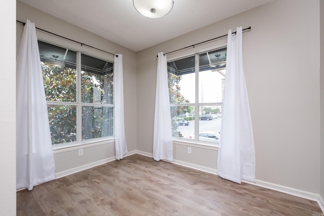 800 N St Unit 48, Little Rock, AR 72201 - unfurnished room featuring wood finished floors and baseboards
