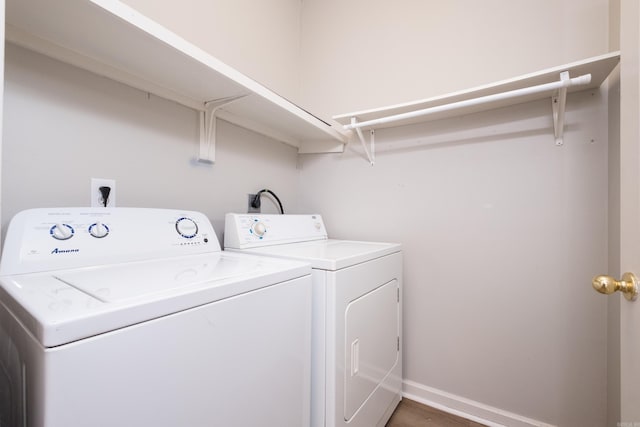 800 N St Unit 48, Little Rock, AR 72201 - laundry area featuring washing machine and clothes dryer and wood finished floors