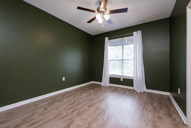 800 N St Unit 48, Little Rock, AR 72201 - empty room featuring light wood-style flooring, ceiling fan, and vaulted ceiling