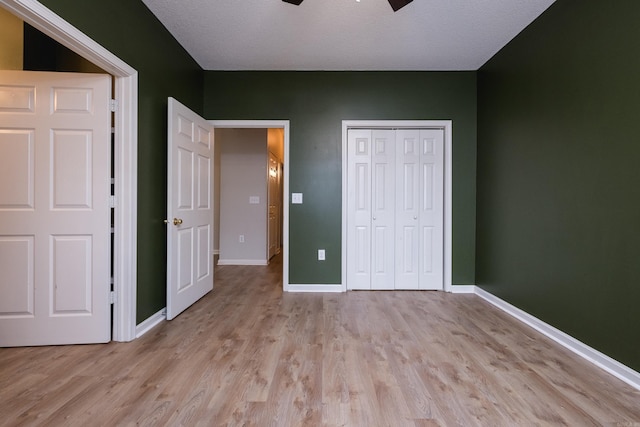 800 N St Unit 48, Little Rock, AR 72201 - unfurnished bedroom featuring light wood-style flooring, a closet, and ceiling fan
