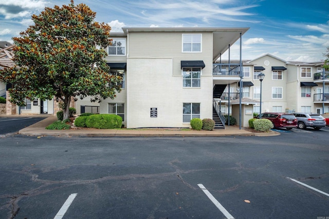 800 N St Unit 48, Little Rock, AR 72201 - view of apartment building / complex featuring uncovered parking and stairs