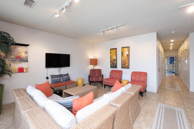 800 N St Unit 48, Little Rock, AR 72201 - living area featuring track lighting and light tile patterned floors