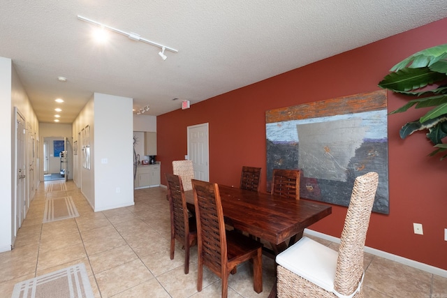 800 N St Unit 48, Little Rock, AR 72201 - dining space with rail lighting, light tile patterned flooring, and recessed lighting
