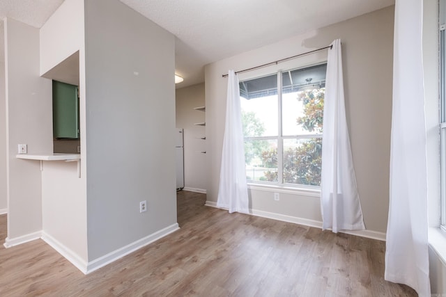 800 N St Unit 48, Little Rock, AR 72201 - unfurnished room with light wood-style floors and baseboards