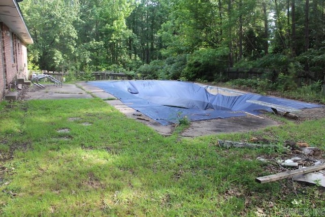 22213 N Springlake Rd, Hensley, AR 72065 - view of swimming pool with a covered pool and a forest view