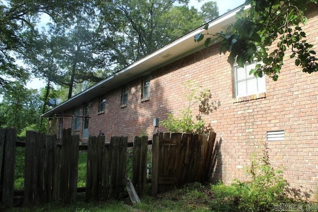 22213 N Springlake Rd, Hensley, AR 72065 - view of side of home with brick siding