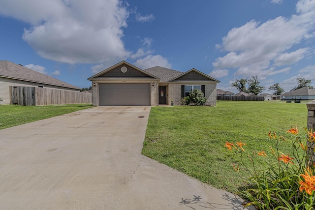 5244 Prospect Trl, Jonesboro, AR 72405 - view of front of property with an attached garage, concrete driveway, and brick siding