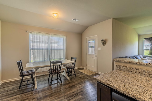 5244 Prospect Trl, Jonesboro, AR 72405 - dining room featuring dark wood-style floors and lofted ceiling