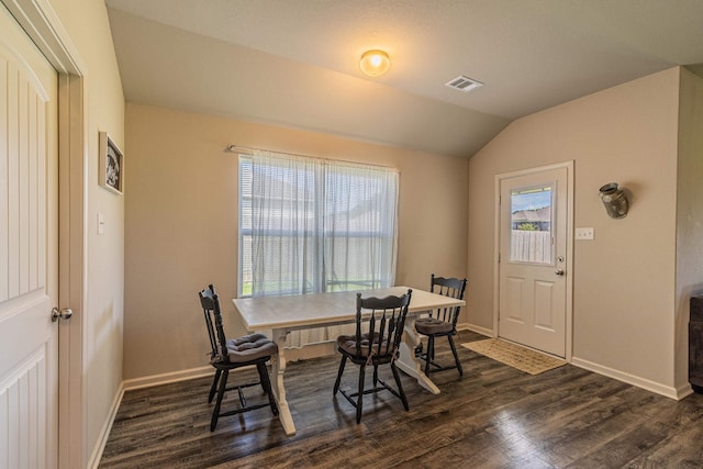 5244 Prospect Trl, Jonesboro, AR 72405 - dining area featuring dark wood-style flooring and vaulted ceiling