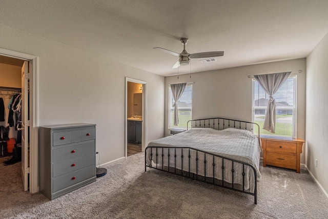 5244 Prospect Trl, Jonesboro, AR 72405 - bedroom with a walk in closet, carpet, a closet, and connected bathroom