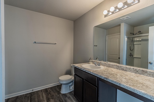 5244 Prospect Trl, Jonesboro, AR 72405 - full bath with wood finished floors, a stall shower, and vanity