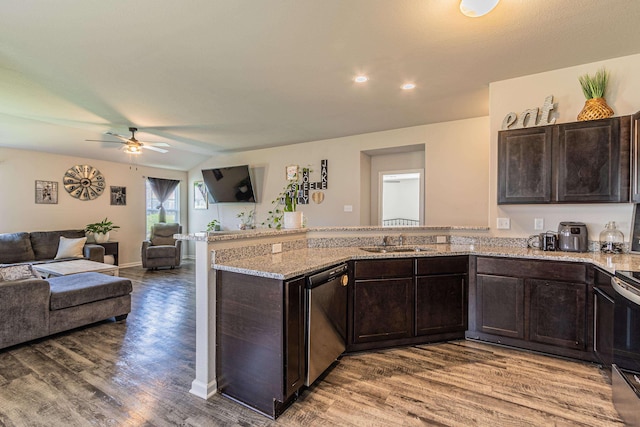5244 Prospect Trl, Jonesboro, AR 72405 - kitchen with dishwasher, a peninsula, open floor plan, wood finished floors, and dark brown cabinets